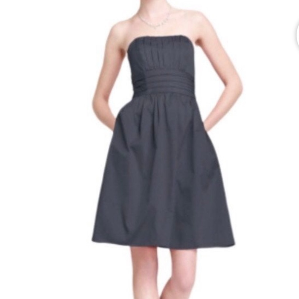 Black cotton satin strapless dress with pockets